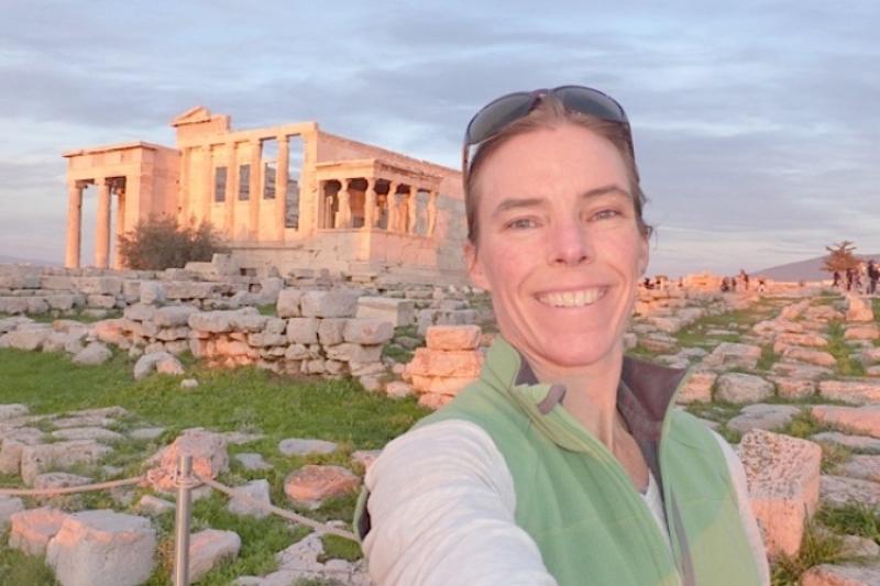 Sarah in front of ruins.  