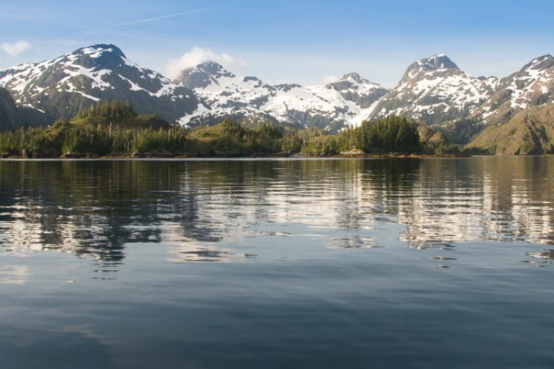 Water with mountains in the background
