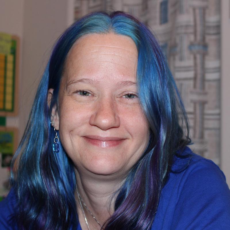 Portrait of woman with blue hair