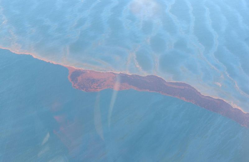 Image from May 25, approximately 12 miles east of Pass a Loutre, Louisiana, showing dark brown and red emulsion. Credit: NOAA